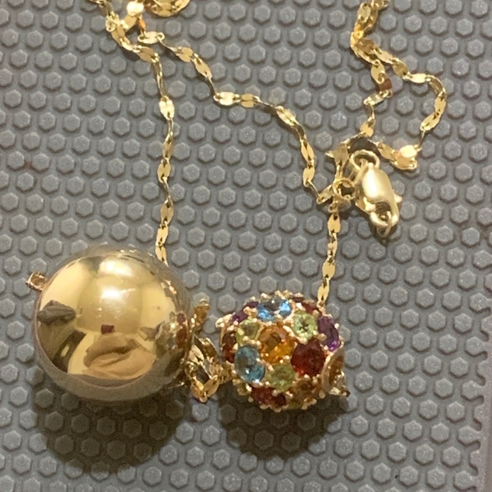 14k gold chain and 2 round pendant spheres, assorted gemstones